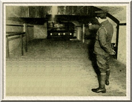 Practising revolver-shooting in the crypt of the Kennington parish
church.