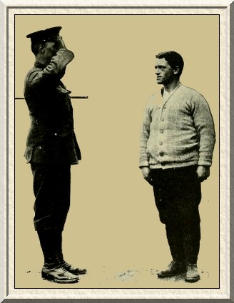 A recruit being taught the regulation salute.