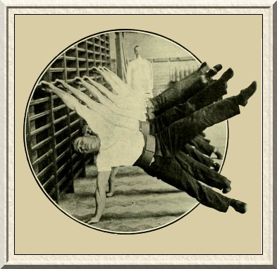 Swedish exercises. At the wall-bars—leg-raising.