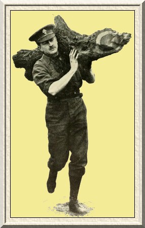 Private C. Armstrong, a Cambridge Blue, carrying a useful log for
the fire.