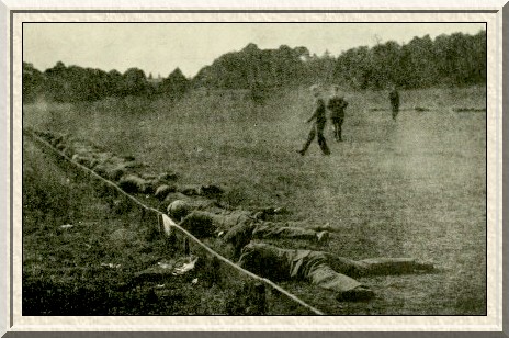 Recruits learning to take cover behind the boards of a polo ground.