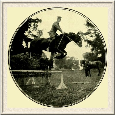 A splendid jump by a British cavalry officer.