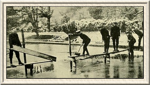Chilly work—bridge construction over a half-frozen stream.