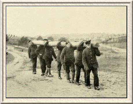 Building a bridge at Branksome.—Carrying the piles to the
stream.