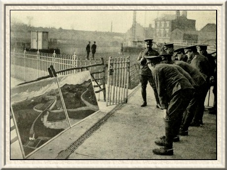 Visual training.—The men have to discover a supposed German
machine-gun which is marked on the map.
