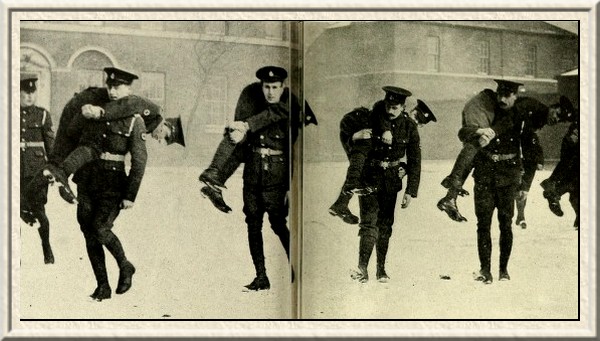 The 1st South Midland Mounted Brigade Field Ambulance practising the
'fireman's lift.'