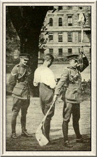 Members of the Inns of Court Officers' Training Corps (the 'Devil's
Own') practise signalling in Lincoln's Inn Fields.